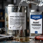 Mzansi Paint Thinner being poured into a larger container with tools and labels visible. Industrial Solvent & Chemical-Resistant Label Experts