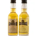 Two bottles of Balvenie whisky on a white background