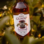 Bottle of Johnnie Walker Red Label whisky with a blurred background