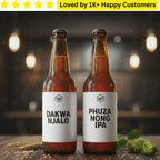 Two bottles of beer with labels 'Dakwa Njalo' and 'Phuza Nong IPA' on a wooden surface with a blurred background.