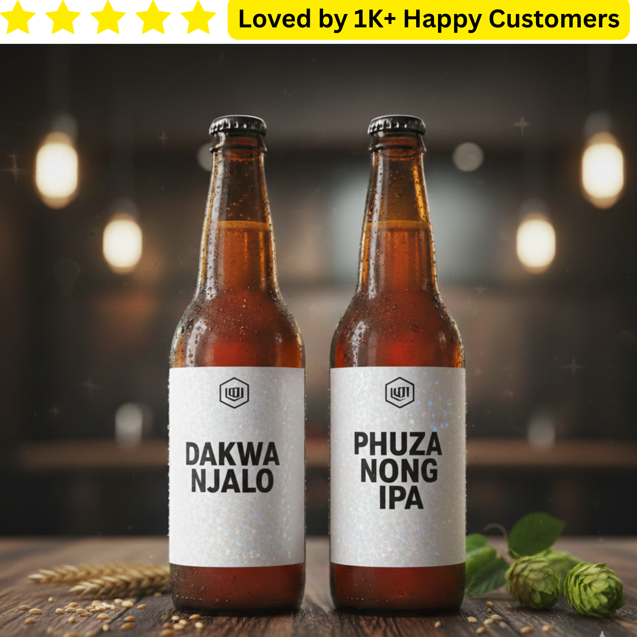 Two bottles of beer with labels 'Dakwa Njalo' and 'Phuza Nong IPA' on a wooden surface with a blurred background.