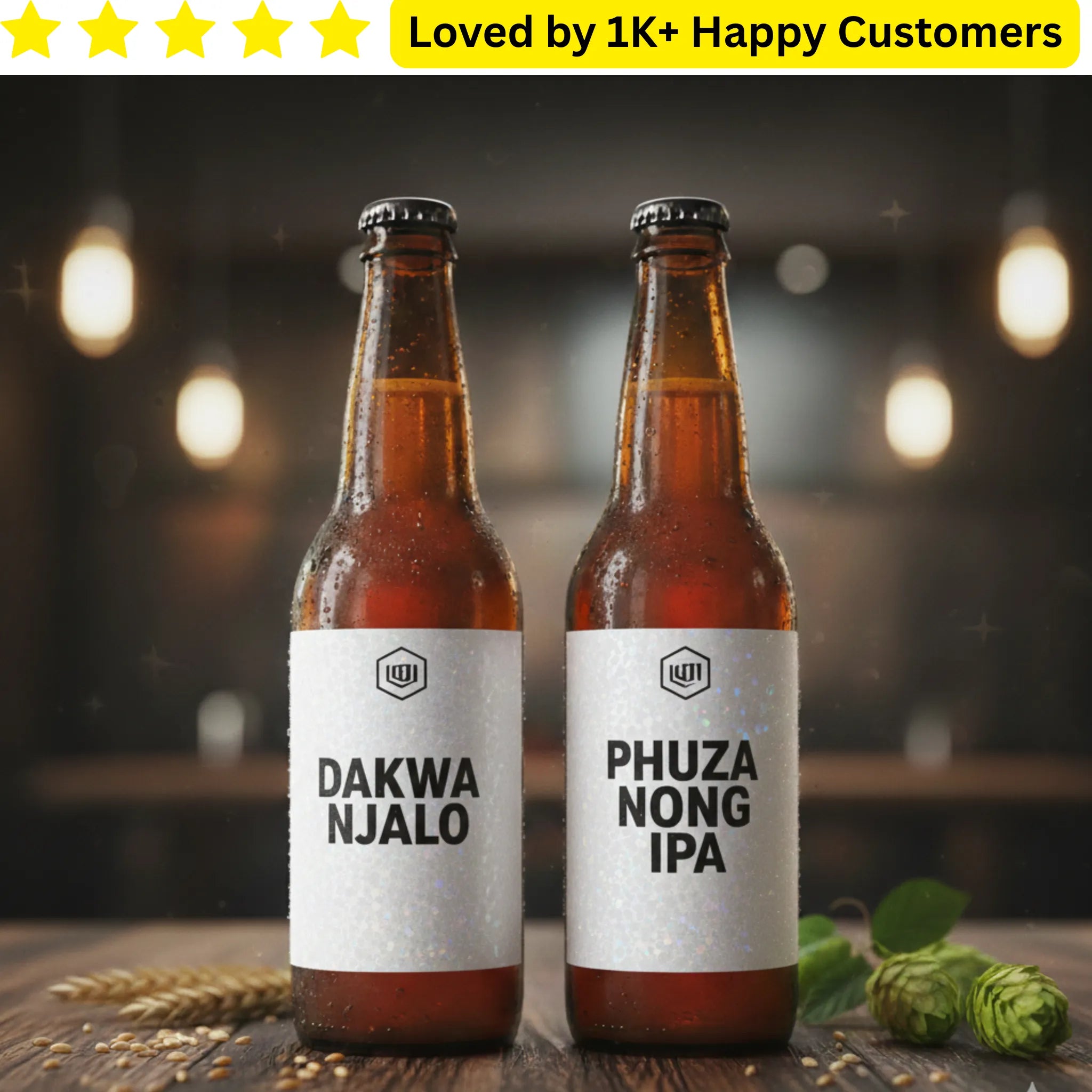 Two beer bottles labeled 'Dakwa Njalo' and 'Phuza Nong IPA' on a wooden surface with a blurred background.