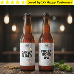 Two bottles of beer with labels 'Dakwa Njalo' and 'Phuza Nong IPA' on a wooden surface with a blurred background.