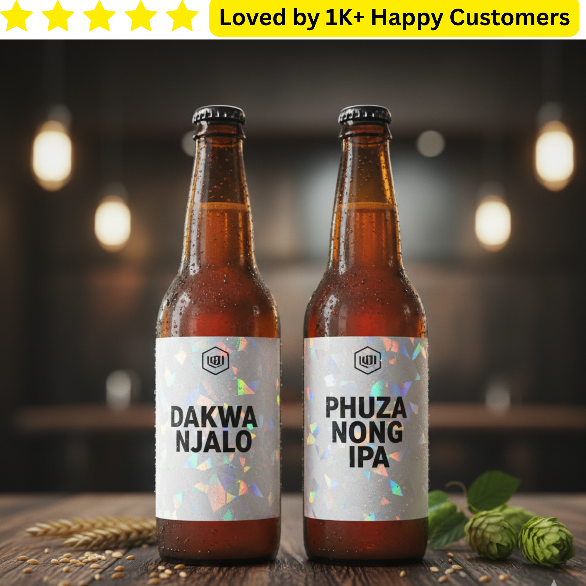 Two bottles of beer with labels 'Dakwa Njalo' and 'Phuza Nong IPA' on a wooden surface with a blurred background.