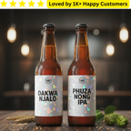 Two beer bottles with labels 'Dakwa Njalo' and 'Phuza Nong IPA' on a wooden surface with a blurred background.