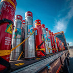 Truck carrying large cylindrical tanks with various labels against a blue sky. Bakkie-Proof™ Industrial Gas &  Cylinder Labels 🏷️🔥